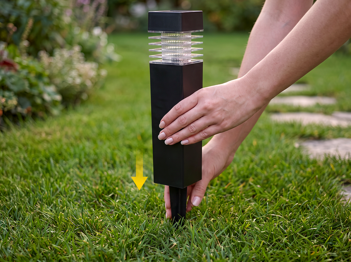 Insert solar pathway light into ground